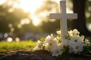 blanco flores en frente de un lápida sepulcral a un cementerio con atardecer.funeral concepto ai generado foto