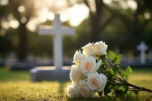 blanco flores en frente de un lápida sepulcral a un cementerio con atardecer.funeral concepto ai generado foto