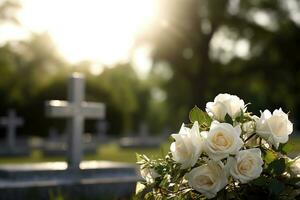 blanco flores en frente de un lápida sepulcral a un cementerio con atardecer.funeral concepto ai generado foto