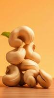 cashews on a light brown background with space for text on the side, background image, vertical format, generative AI photo