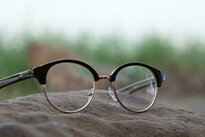 Glasses on blur background photo