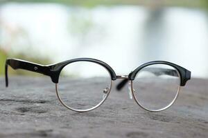 Glasses on blur background photo