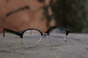 Glasses on blur background photo