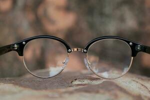 Glasses on blur background photo