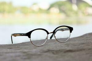 Glasses on blur background photo