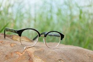 Glasses on blur background photo