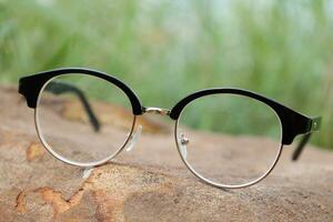 Glasses on blur background photo