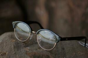 Glasses on blur background photo