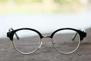 Glasses on blur background photo