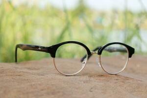 Glasses on blur background photo