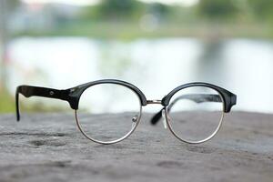Glasses on blur background photo