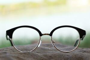 Glasses on blur background photo