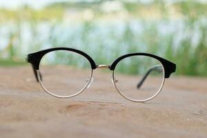 Glasses on blur background photo