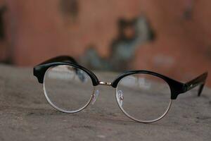 Glasses on blur background photo