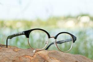 Glasses on blur background photo