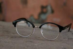 Glasses on blur background photo