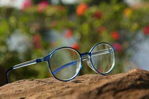 Closeup of a glasses on blur background photo