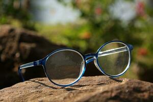 Closeup of a glasses on blur background photo