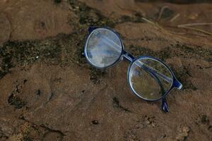 Closeup of a glasses on blur background photo