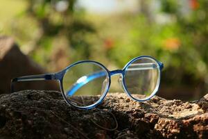 Closeup of a glasses on blur background photo