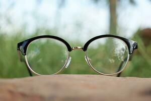 Glasses on blur background photo