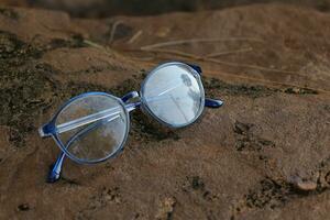 Closeup of a glasses on blur background photo