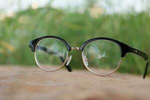 Glasses on blur background photo