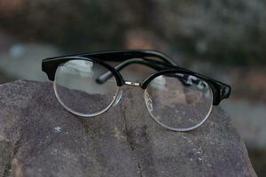 Glasses on blur background photo