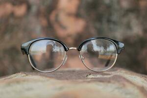 Glasses on blur background photo