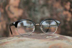 Glasses on blur background photo