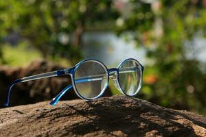 Glasses on blur background photo