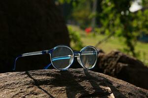 Glasses on blur background photo