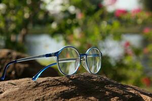 Glasses on blur background photo