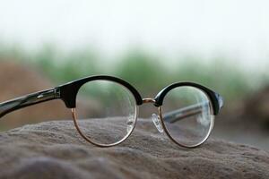 Glasses on blur background photo