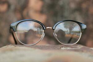 Glasses on blur background photo