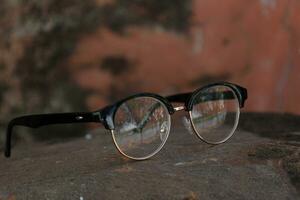 Glasses on blur background photo