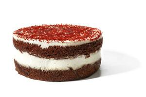 A red velvet cake, isolated on a white background. A red velvet cake is a soft red velvet treat with a perfect balance of sweet and tart, topped with a silky, creamy layer of cream cheese frosting. photo