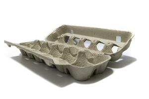 An egg carton container, for a dozen eggs. Isolated on a white background. Eco products concept. photo