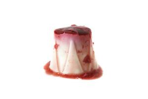 Panna cotta with strawberry sauce, isolated on a white background. Italian food concept. photo