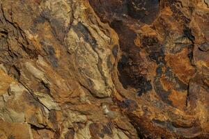 Background of a stone and metal texture. The perfect combination of strength and elegance. photo