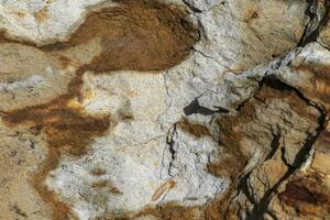 Background of a stone and metal texture. The perfect combination of strength and elegance. photo