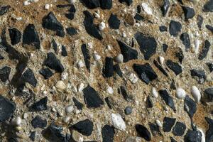 Background of a stone and metal texture. The perfect combination of strength and elegance. photo