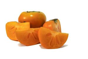 Persimmons isolated on white background. Persimmons, with their mild sweetness and distinctive soft texture, are a fall fruit that adds a touch of seasonal deliciousness to any dish or dessert. photo