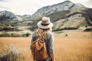 Young woman with backpack hiking in the mountains. Travel and adventure concept. AI generated photo