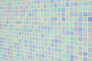 a blue and white tile wall with squares photo