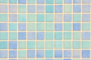 a blue and white tile wall with squares photo