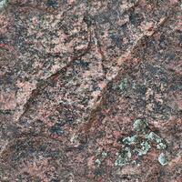 Photo realistic seamless texture pattern of granite stone walls in high resolution..