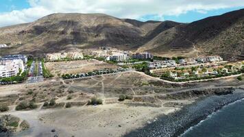 Drone view of many hotels at the beach on the Canary Island of Tenerife photo