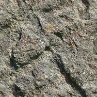 Photo realistic seamless texture pattern of granite stone walls in high resolution..