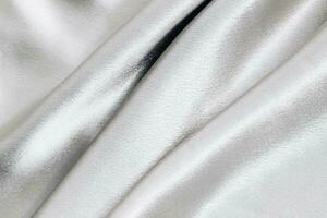 Silvery smooth silk texture of beauty silk photo